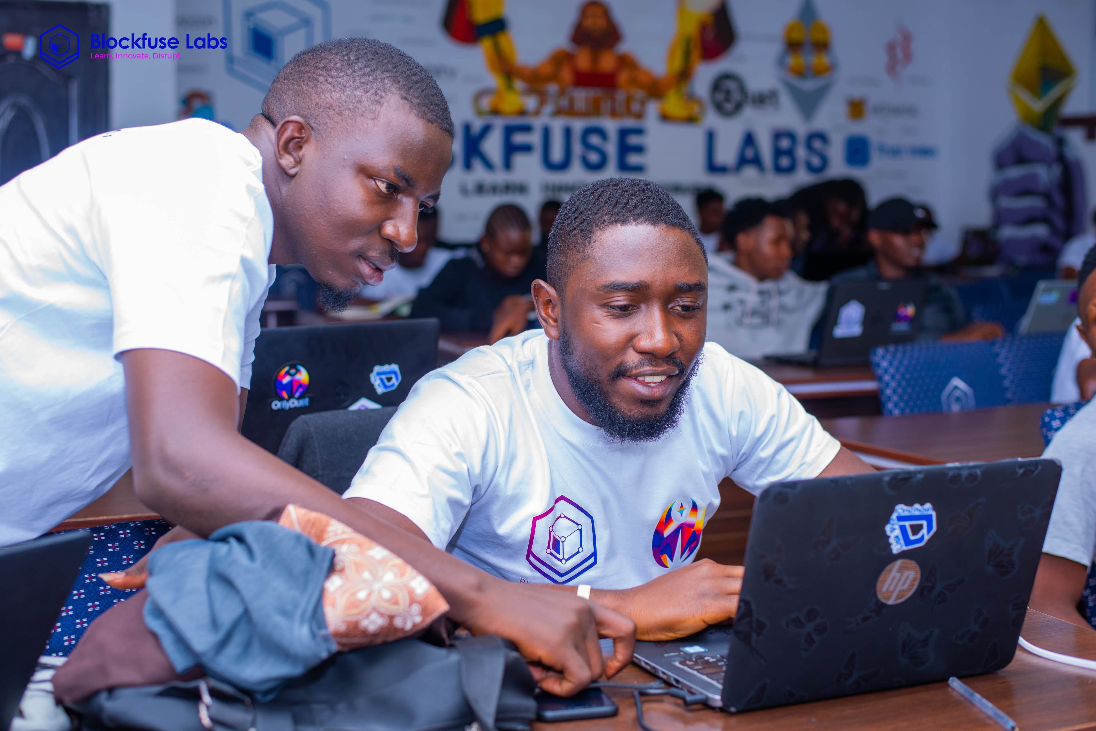Two builders working together during a Blockfuse event