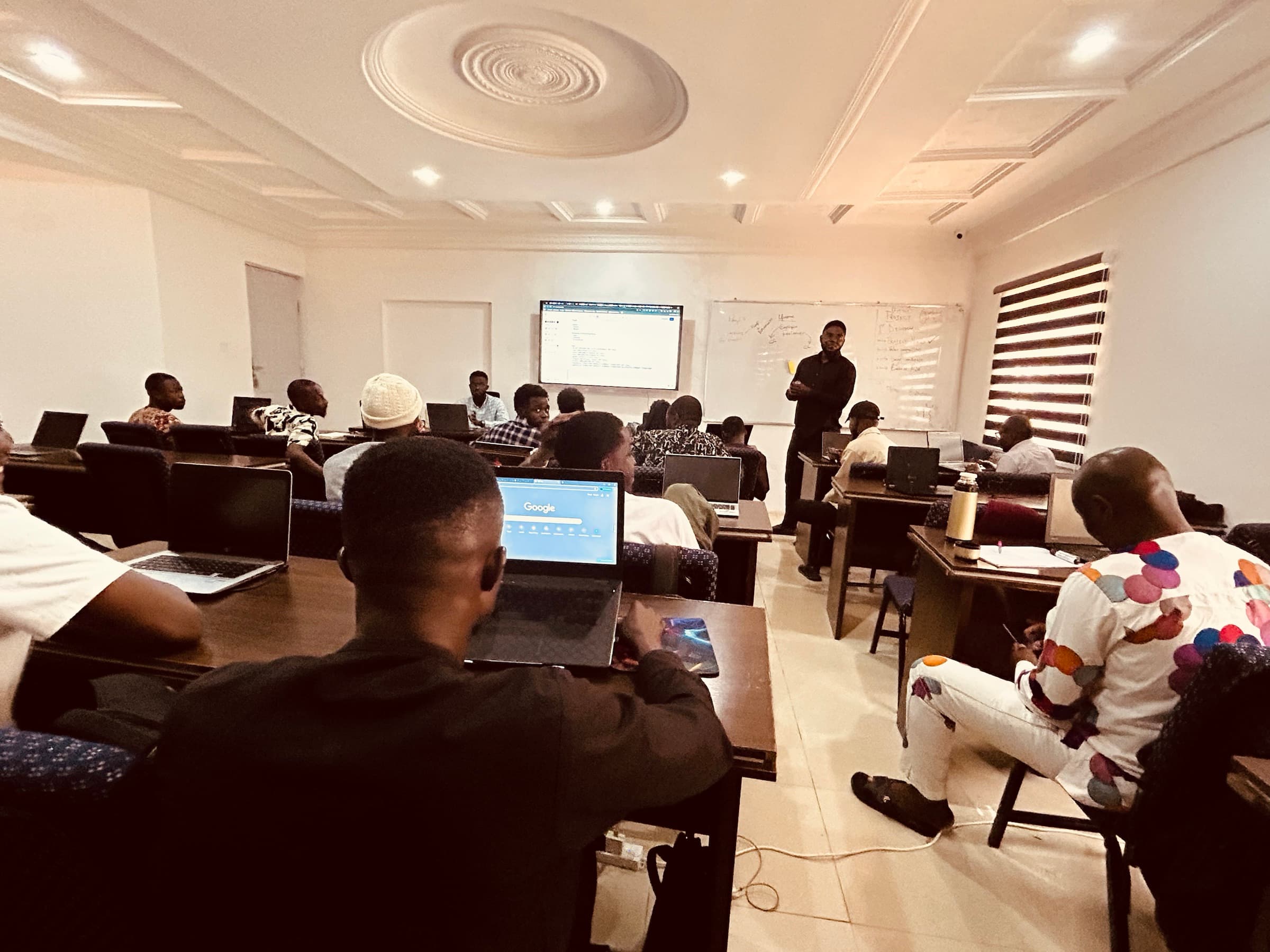 Engineers learning together in a Blockfuse classroom
